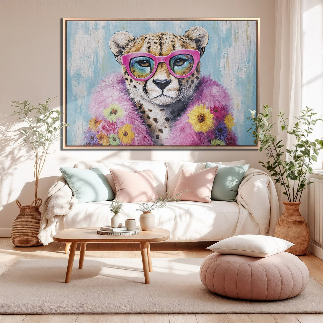 Framed Wall Art: Stylish cheetah portrait with pink glasses and fur. Pastel color palette adds a chic touch to any interior. Get yours today!