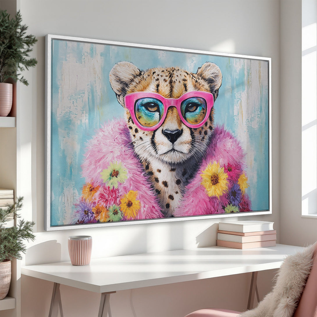 Framed Wall Art: Whimsical cheetah portrait with pink glasses & fur, vibrant colors. Modern art for home decor, adds a playful pop of color.