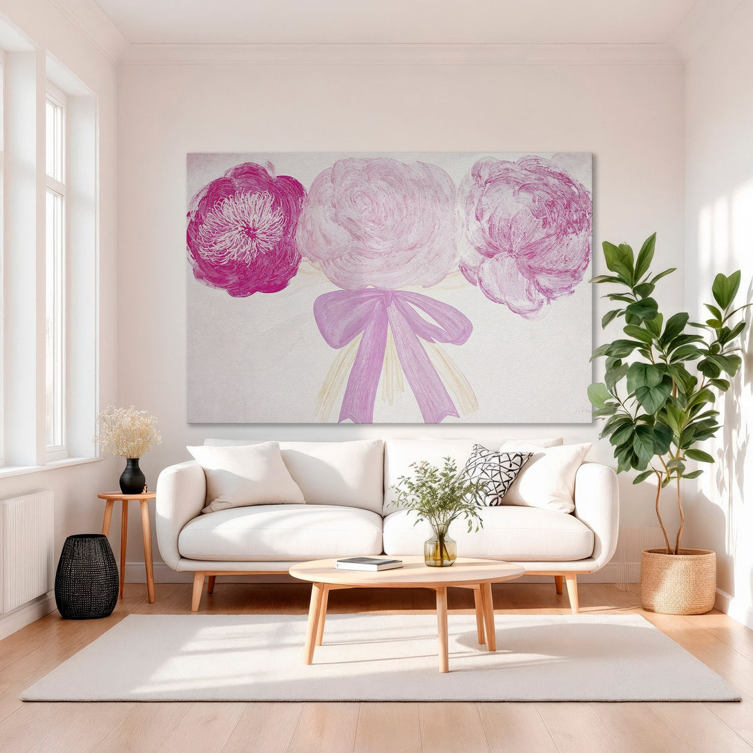 Framed Wall Art: Pink floral painting in a gold frame. Modern, abstract style with a soft pink color palette. Adds elegance to any interior.