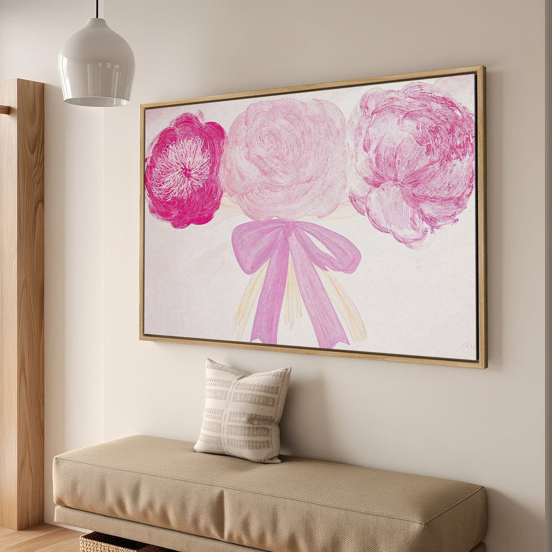 Framed Wall Art featuring a vibrant pink floral bouquet in a modern, abstract style. Adds a pop of color to any space!