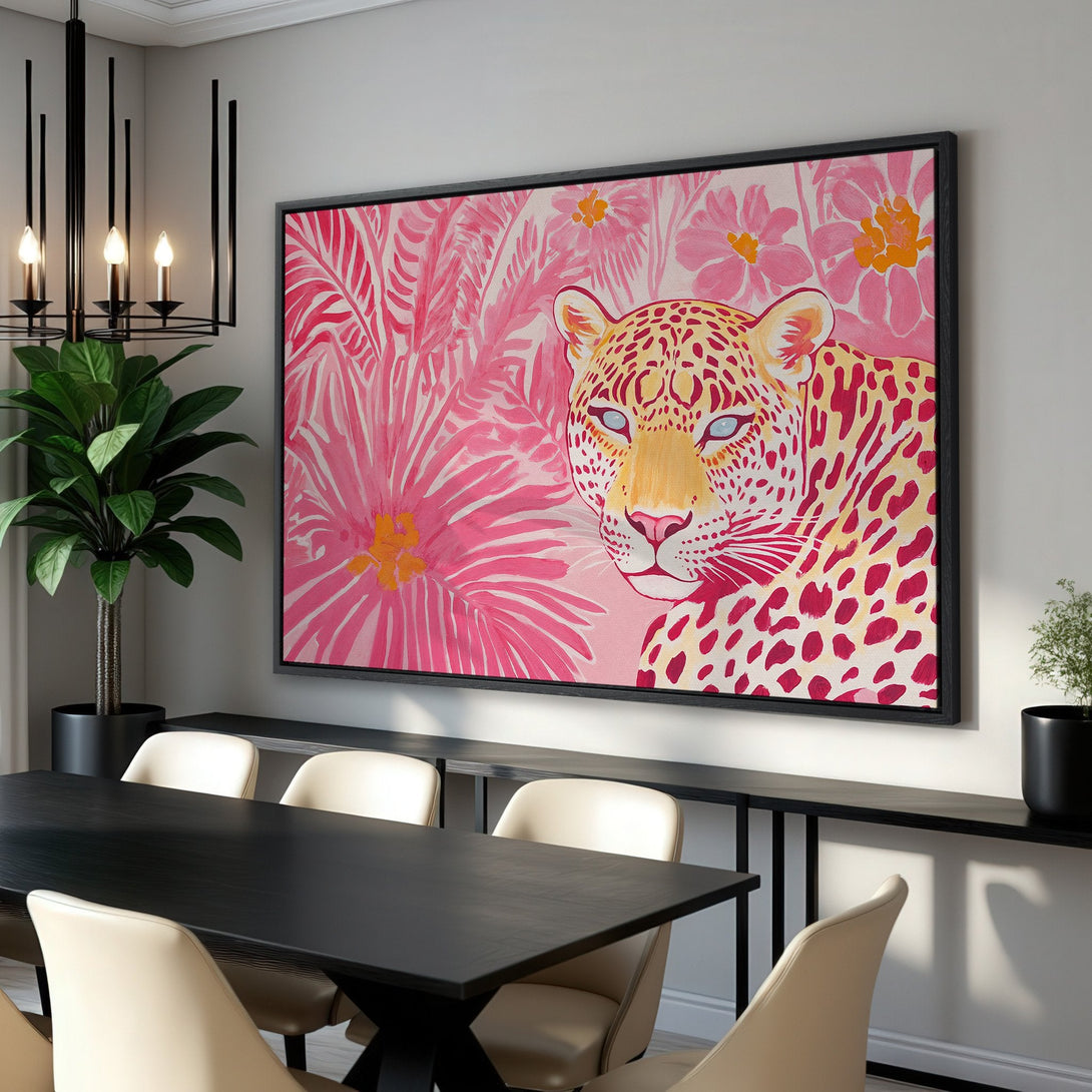 Framed Wall Art: Vibrant pink leopard print canvas art. Modern style with a tropical floral background. Adds a pop of color to any room!