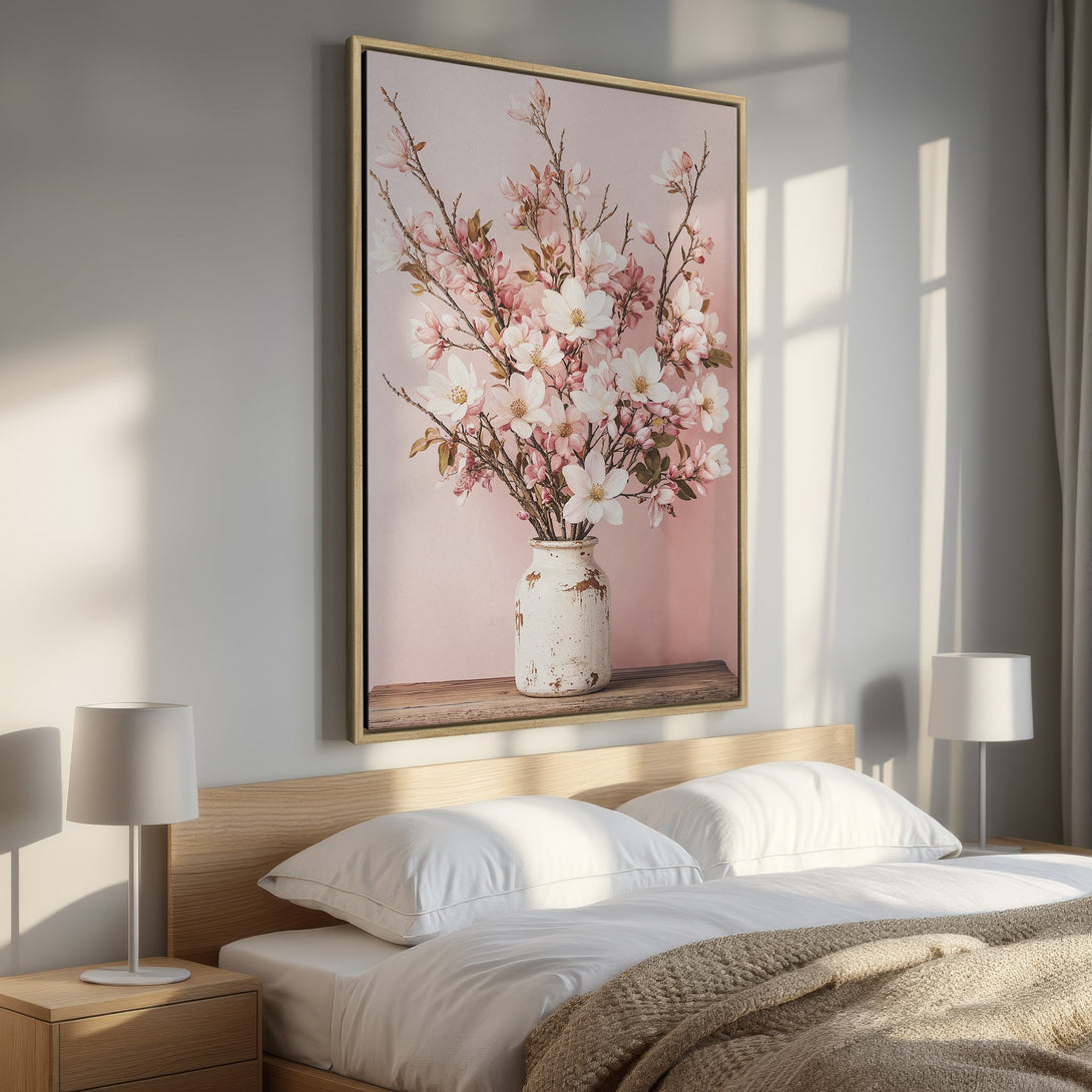 Framed Wall Art featuring a floral still life in soft pink and white hues. Perfect for adding a touch of elegance to your bedroom decor.
