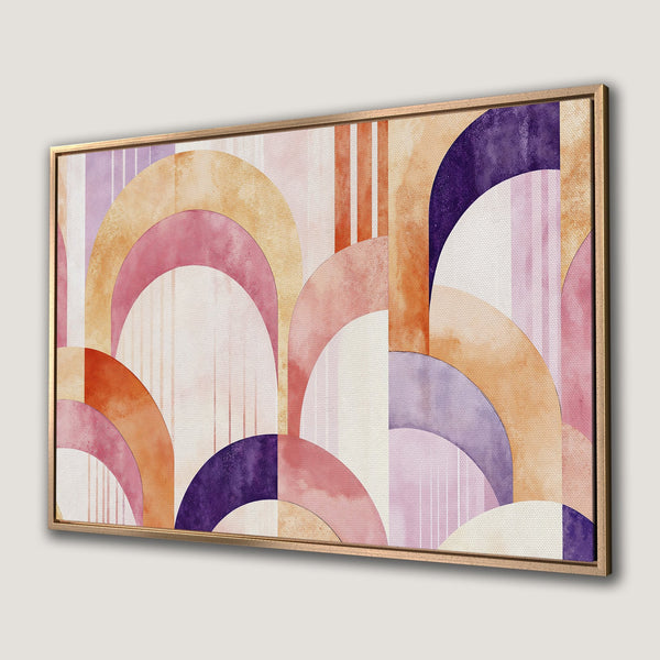 Framed Wall Art featuring a watercolor abstract design with geometric shapes in a warm, inviting color palette of pinks, oranges, and purples.