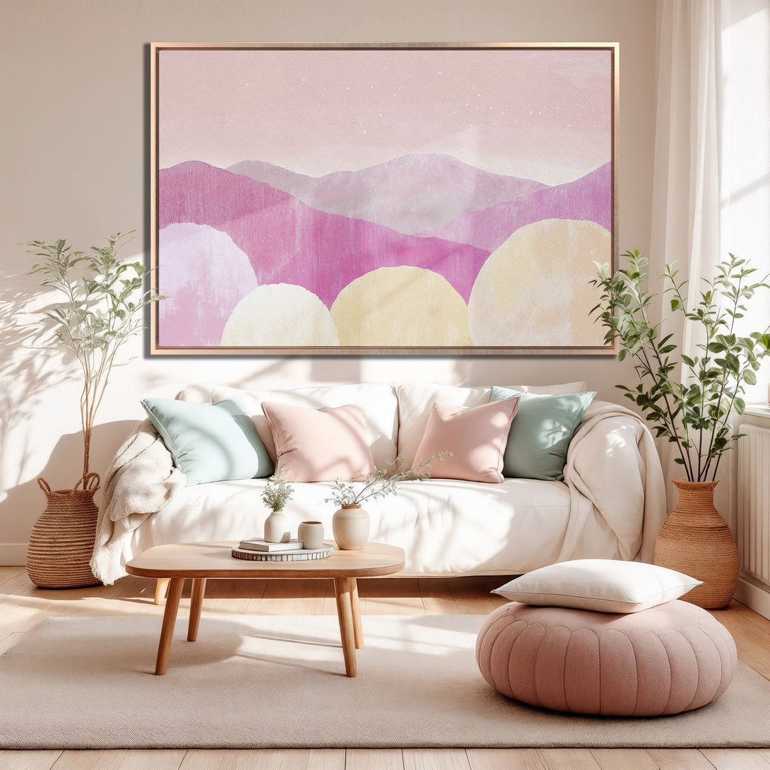 Framed Wall Art featuring abstract mountain landscape in pink and cream hues, perfect for adding a touch of modern art to your living room.