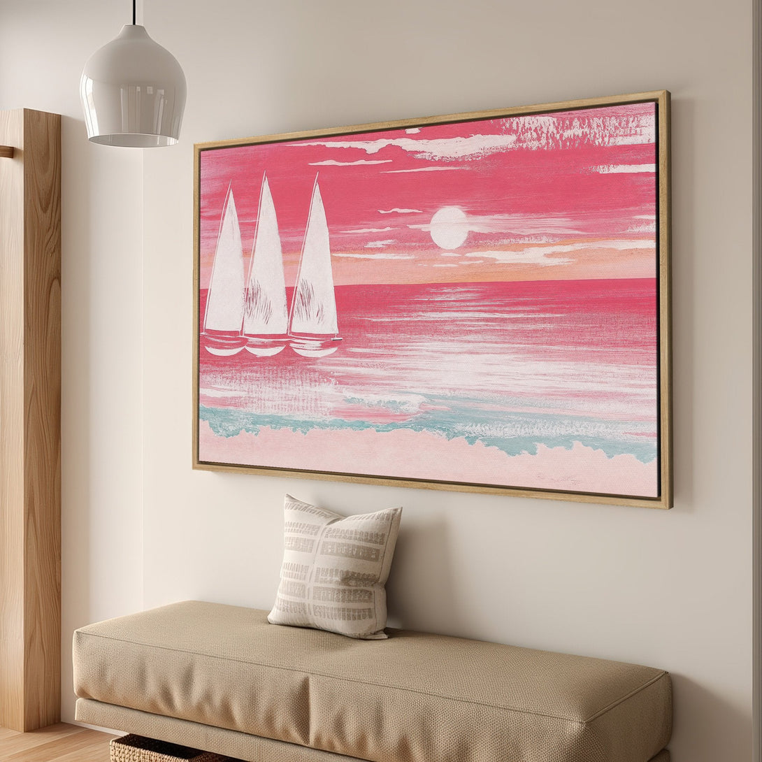 Framed Wall Art featuring a sailboat scene in a pink and blue color palette. Coastal art style perfect for adding a touch of serenity to any space.