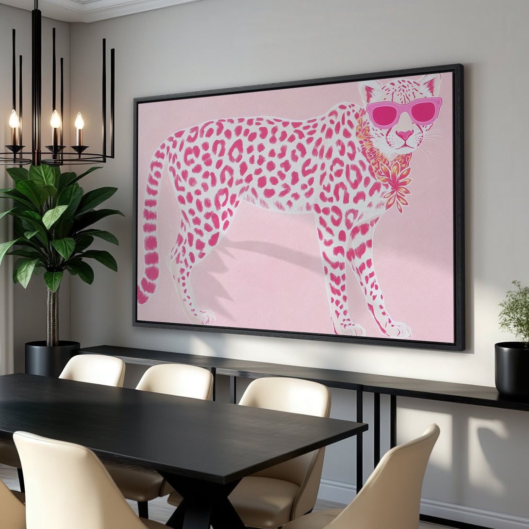 Framed Wall Art: Pink leopard print canvas print in a modern dining room. Stylish animal art with pink and white color palette. Shop now!