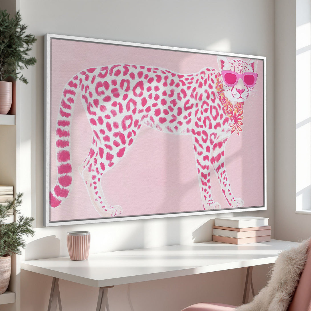 Framed Wall Art: Playful pink cheetah print canvas, perfect for a pop of color! Modern style with a pink and white palette. Add a touch of fun to your decor!