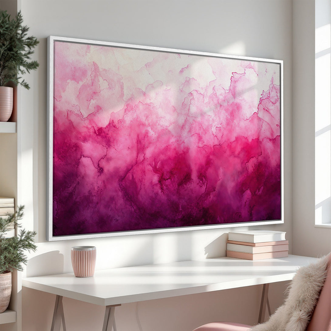Framed Wall Art featuring a vibrant abstract watercolor design in shades of pink and purple, perfect for adding a pop of color to any space.