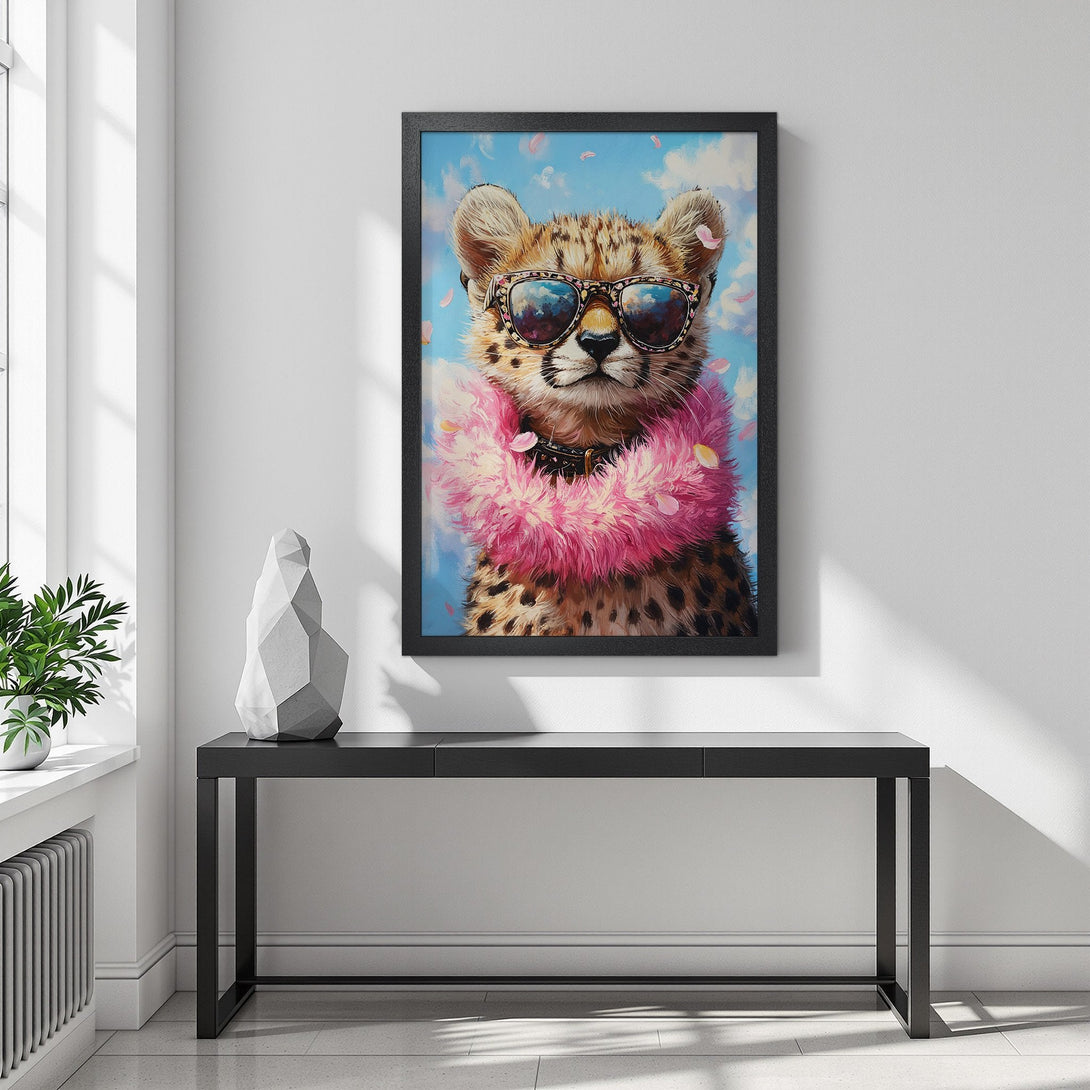 Framed Poster featuring a stylish cheetah with sunglasses and a pink boa, vibrant art with blue, pink, and brown tones.