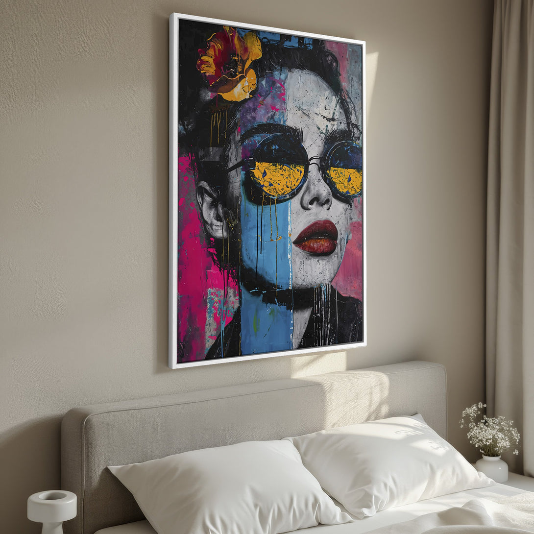 Framed Wall Art: Bold pop art portrait with vibrant pink, blue, and yellow accents. Modern canvas print adds a stylish touch to any bedroom decor.