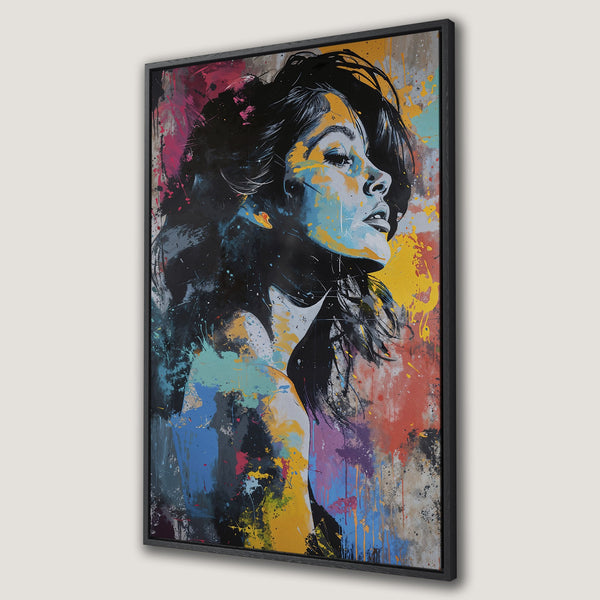 Framed Wall Art: Abstract portrait of a woman with colorful paint splatter. Modern canvas print with a vibrant blue, yellow, and red palette. Perfect for any room!