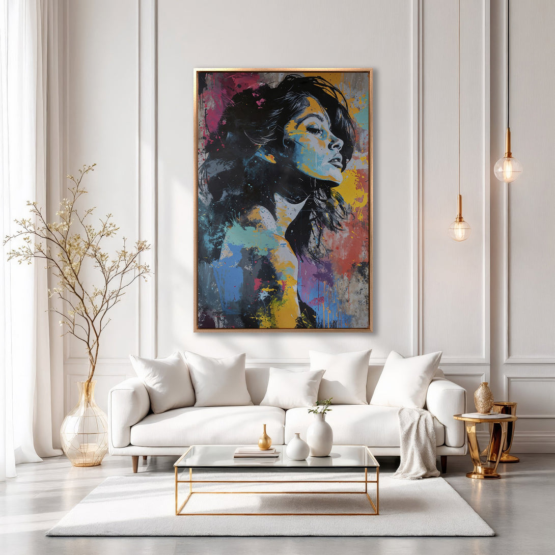 Framed Wall Art featuring a woman's portrait in a modern, abstract style with a colorful palette of blues, yellows, and reds. Perfect for home decor!