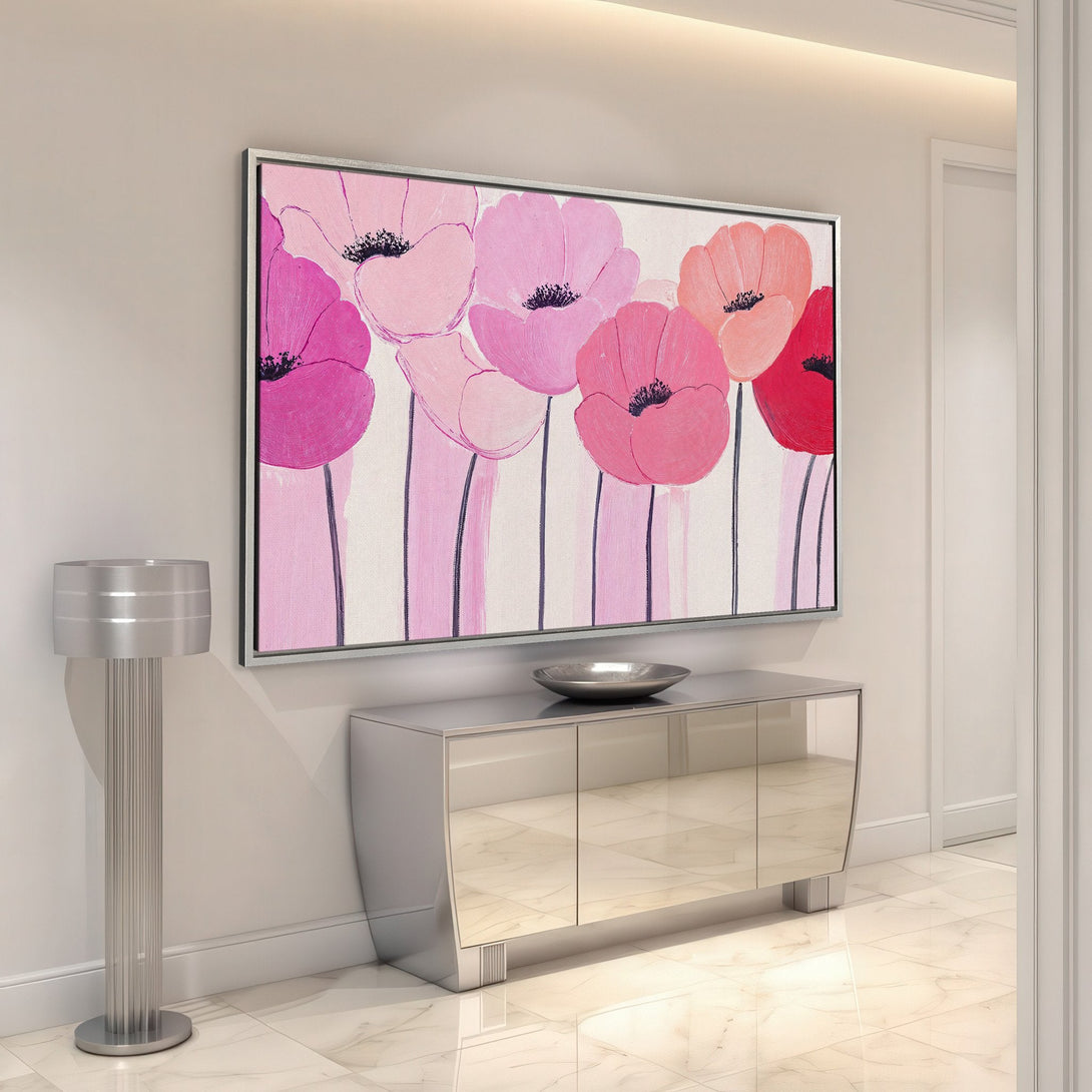 Framed Wall Art featuring vibrant pink poppy flowers. Modern art style with a pink and red color palette, perfect for adding a pop of color to any room.
