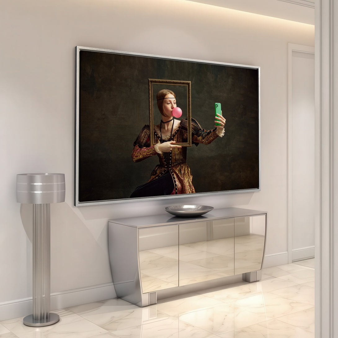 Framed Wall Art: Renaissance woman taking selfie with bubblegum, set in a modern interior. Earthy tones with pops of pink and green. Elevate your space!