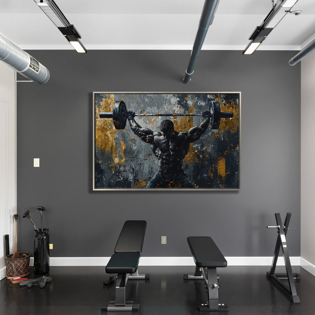 Framed Wall Art: Abstract weightlifter canvas print in a modern gym. Features a dark, moody palette with gold accents for a powerful aesthetic.