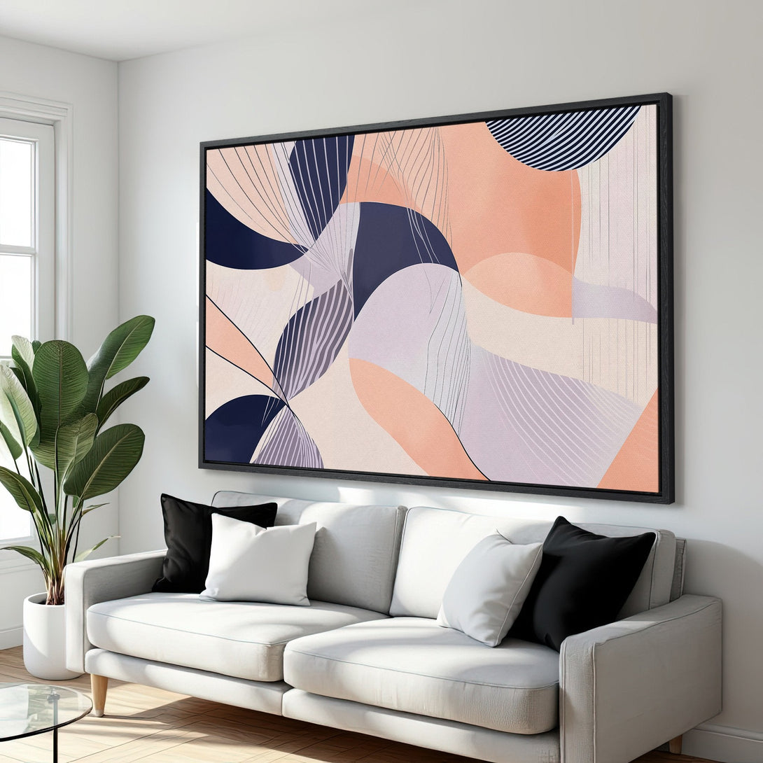 Framed Wall Art: Abstract art Canvas Print in a modern living room. Features a soft color palette of peach, navy, and lavender. Perfect for home decor!
