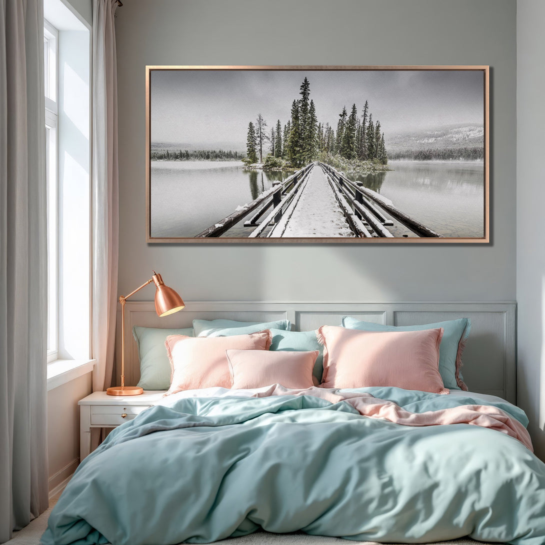 Framed Wall Art: Serene winter landscape Canvas Print in a bedroom. Features a neutral palette with pops of green and pink, creating a calming aesthetic.