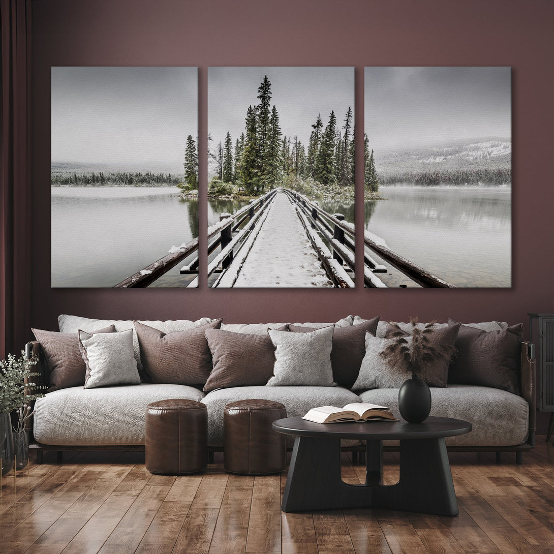 Canvas Print of a snowy bridge over a lake. Serene landscape art in a neutral, gray and green color palette. Perfect for home decor.