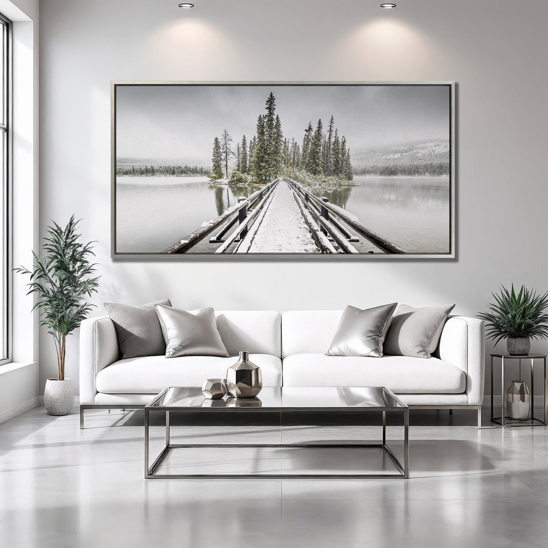 Framed Wall Art: Serene winter landscape with a bridge leading to an island. Neutral color palette, perfect for modern home decor. Bring nature indoors!