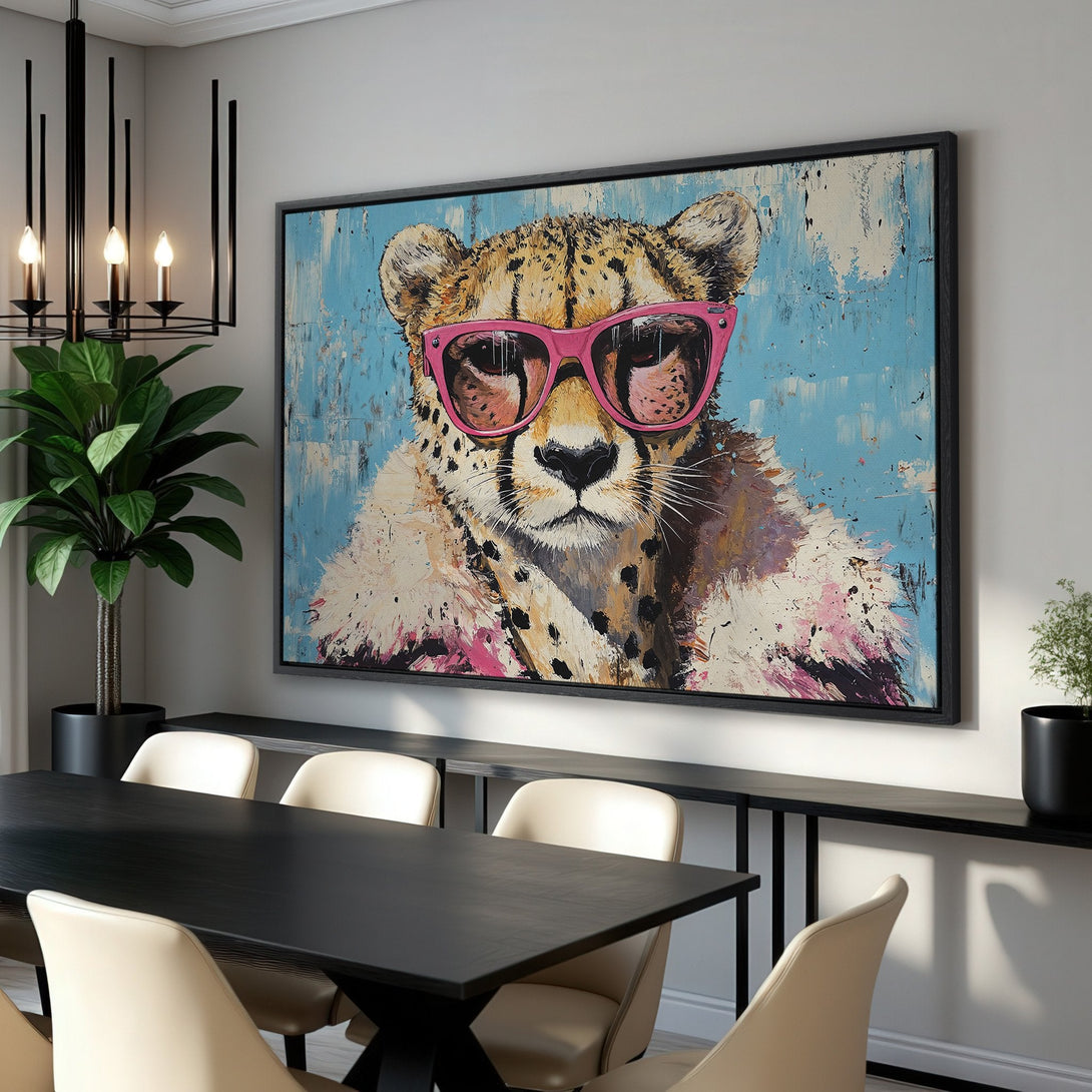 Framed Wall Art: Cool cheetah portrait with pink glasses. Modern art in a blue, pink, and neutral color palette. Perfect for adding a touch of fun to your space!