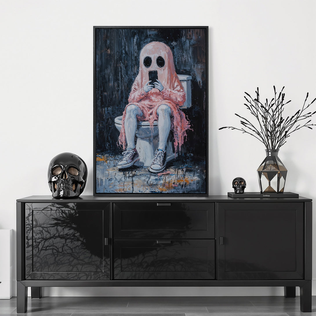Framed Wall Art: Modern pop art canvas print of a ghost on the toilet, featuring a dark, moody palette with pink and blue accents. Perfect for unique decor!