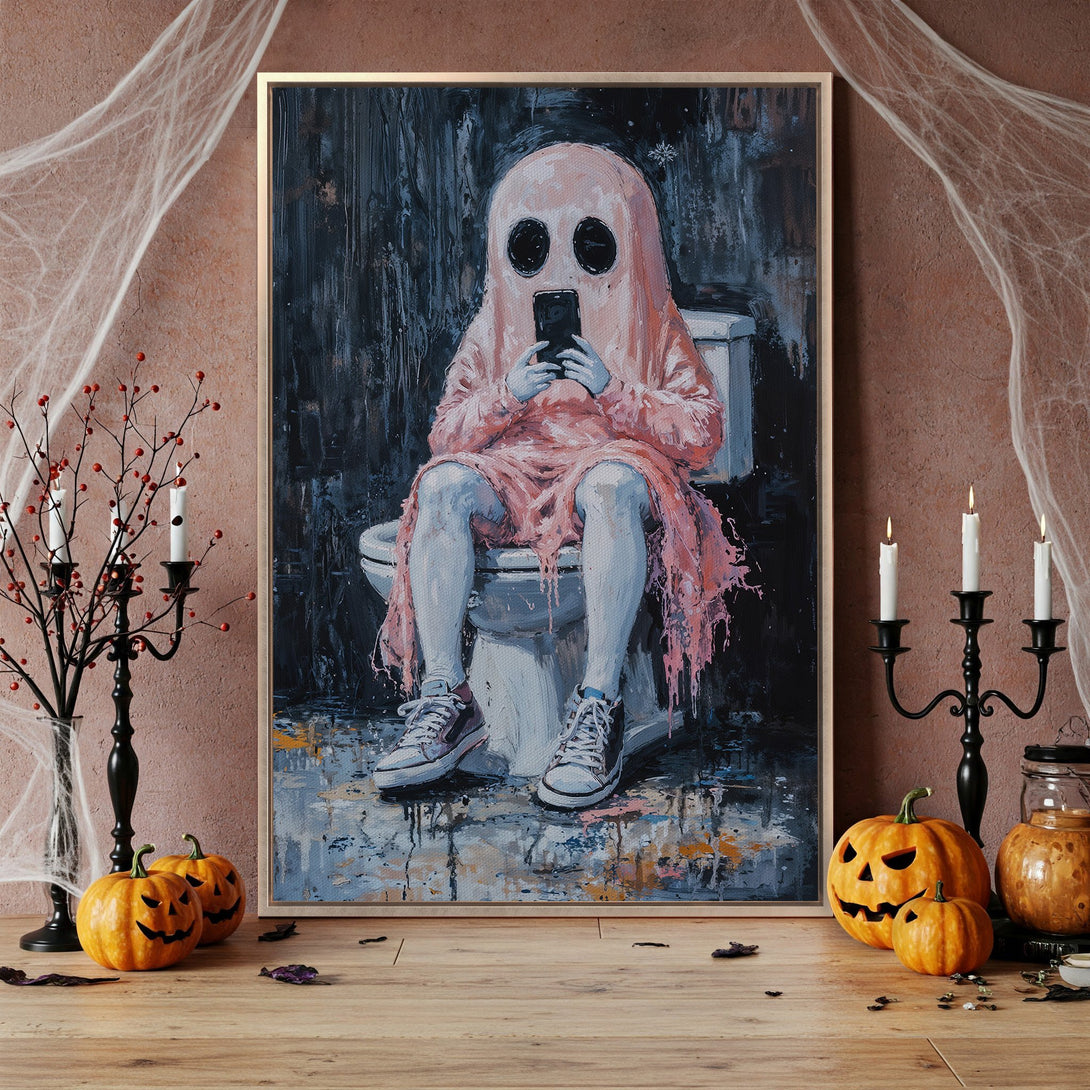 Framed Wall Art featuring a ghost on the toilet, modern art style. Dark blue, pink, and white color palette. Perfect for Halloween decor.