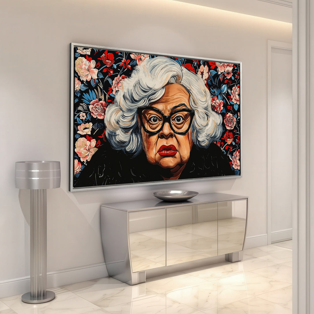 Framed Wall Art featuring a portrait of a woman with floral background. Bold colors of red, black, and pink. Perfect for modern home decor.