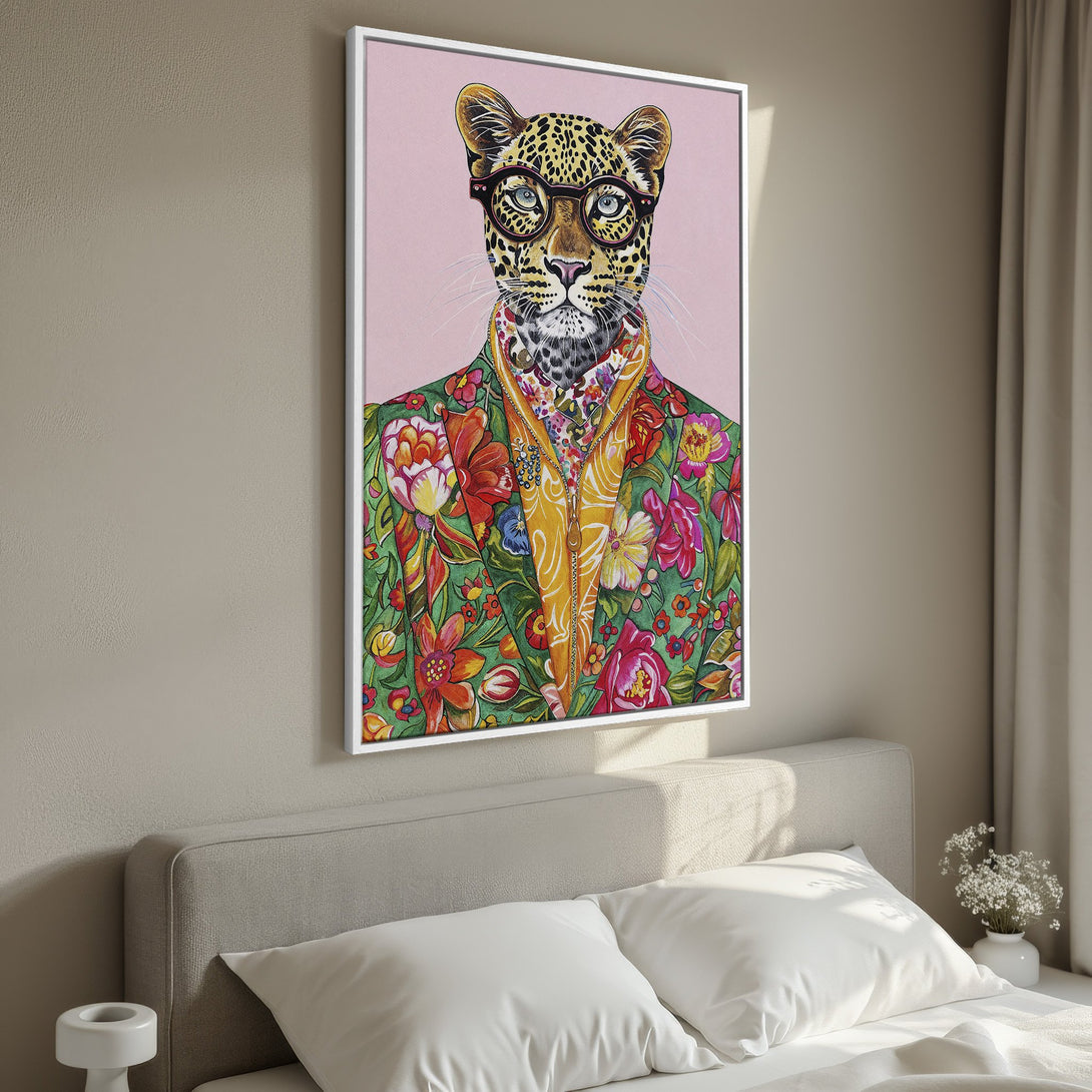 Framed Wall Art: Stylish leopard in floral jacket. Vibrant colors on pink background. Perfect for adding a pop of personality to your space. Shop now!