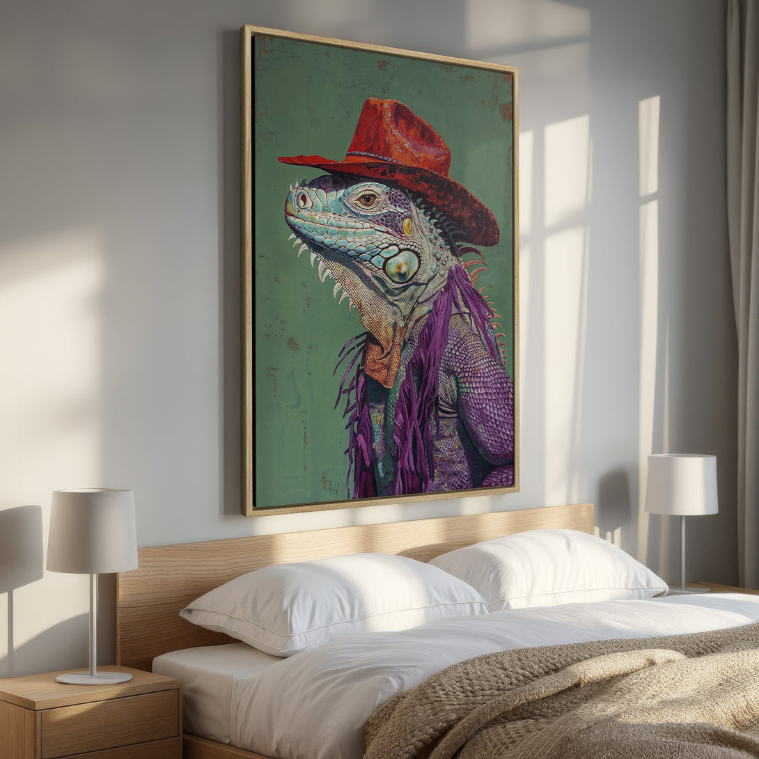 Framed Wall Art featuring a vibrant iguana in a cowboy hat. Bold colors of red, purple, and teal pop against a green background, perfect for adding personality.