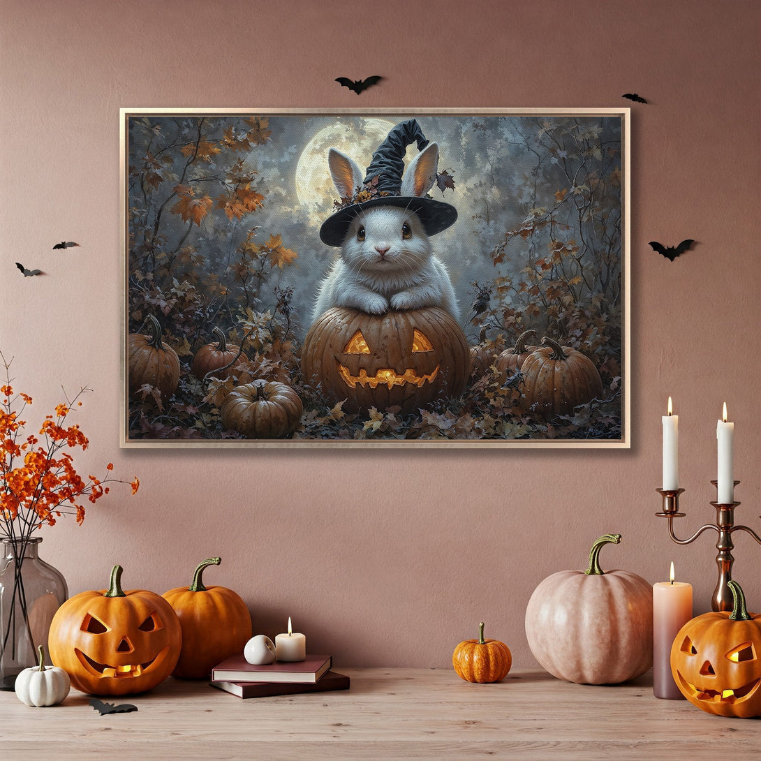 Framed Wall Art: Halloween bunny in witch hat on pumpkin, autumn colors, perfect for spooky decor.