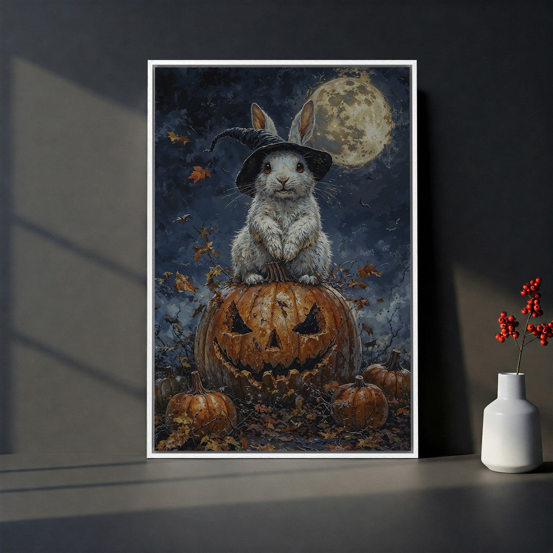 Framed Wall Art: Whimsical Halloween bunny on pumpkin, dark blue and orange palette. Perfect for spooky season decor. Canvas Print.