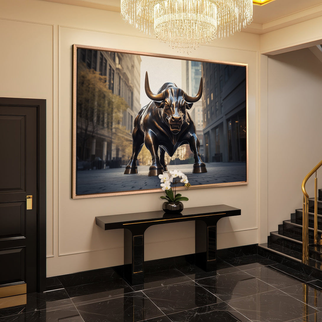 Framed Wall Art: Charging Bull canvas print in a luxury interior. Bronze bull sculpture against city backdrop. Neutral color palette, sophisticated home decor.