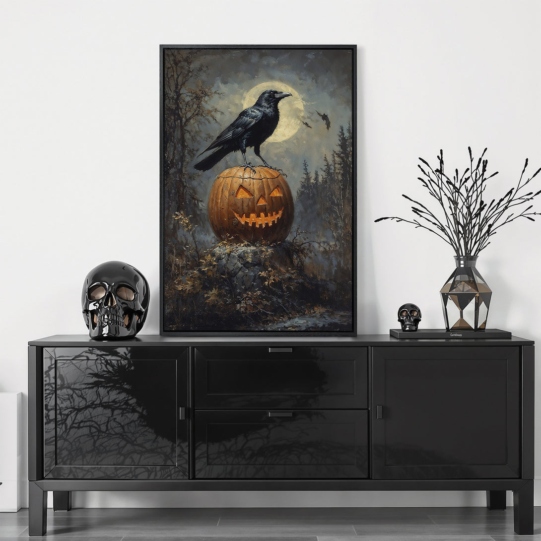 Framed Wall Art featuring a spooky raven on a pumpkin in a dark, moody style. A striking Halloween canvas print with a dramatic, gothic color palette.