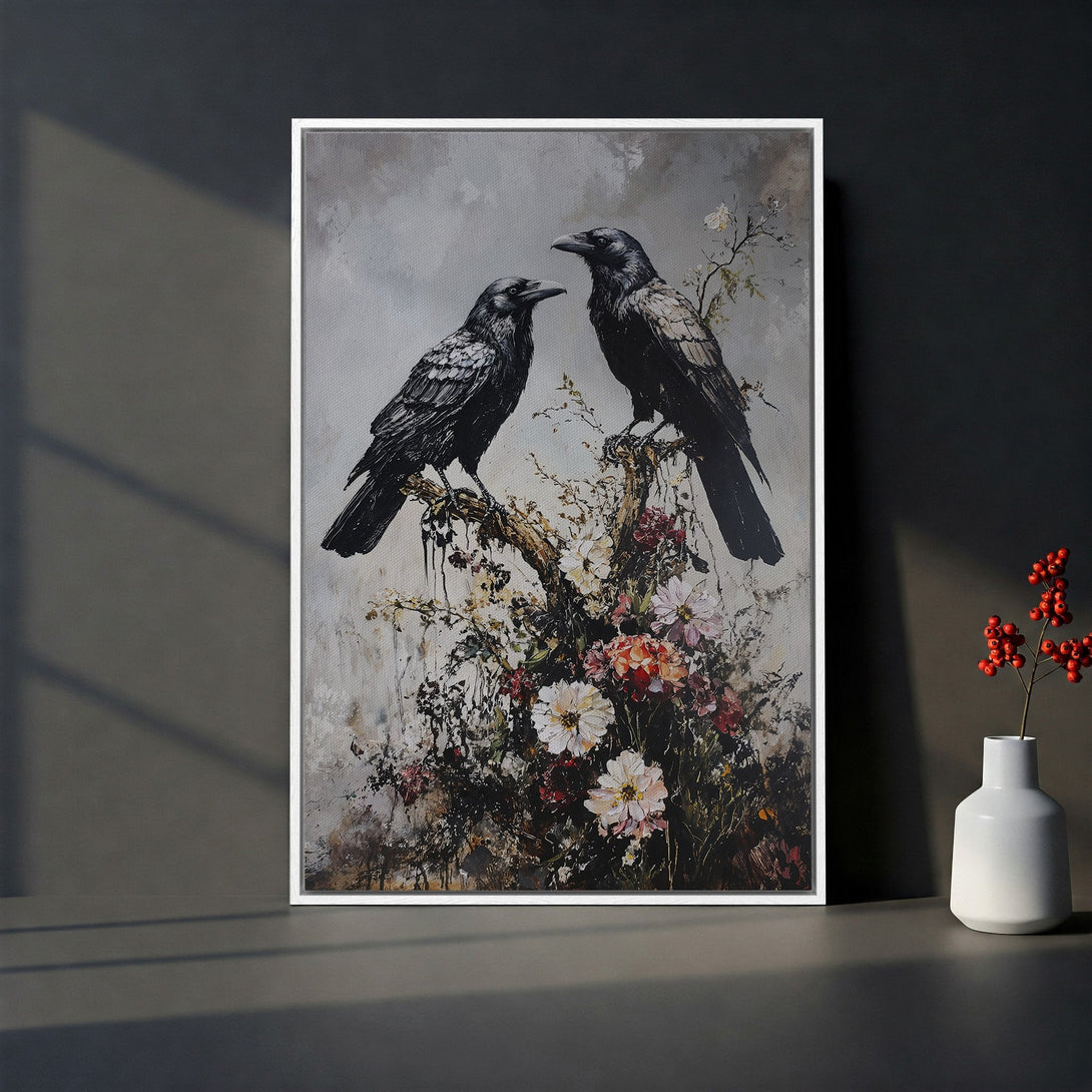 Framed Wall Art featuring two black ravens perched on a floral branch. Dark, moody color palette with a vintage, artistic style. Perfect for home decor.