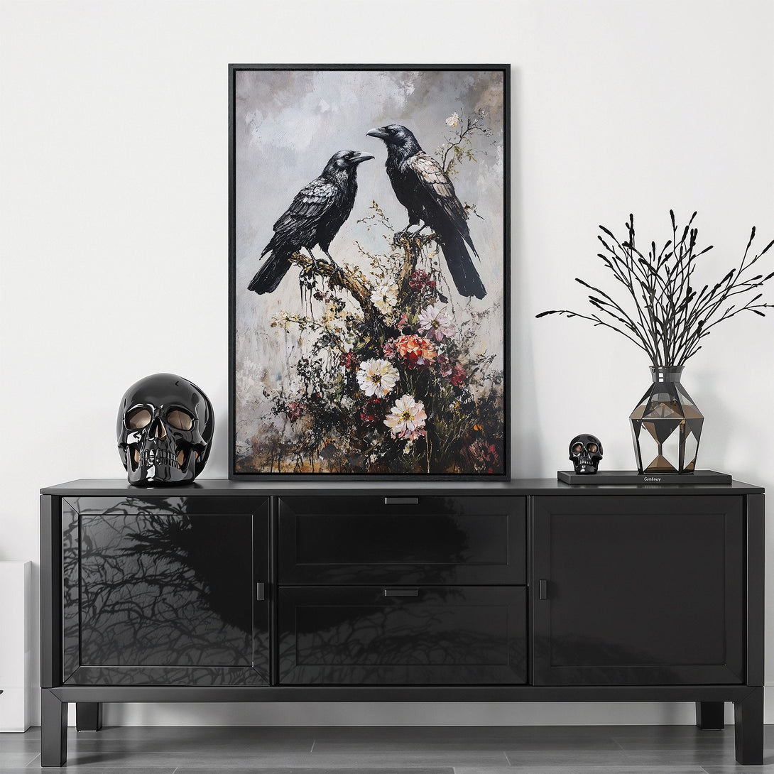 Framed Wall Art featuring two black ravens on a floral branch. Moody, artistic style with a neutral and black color palette, perfect for modern decor.
