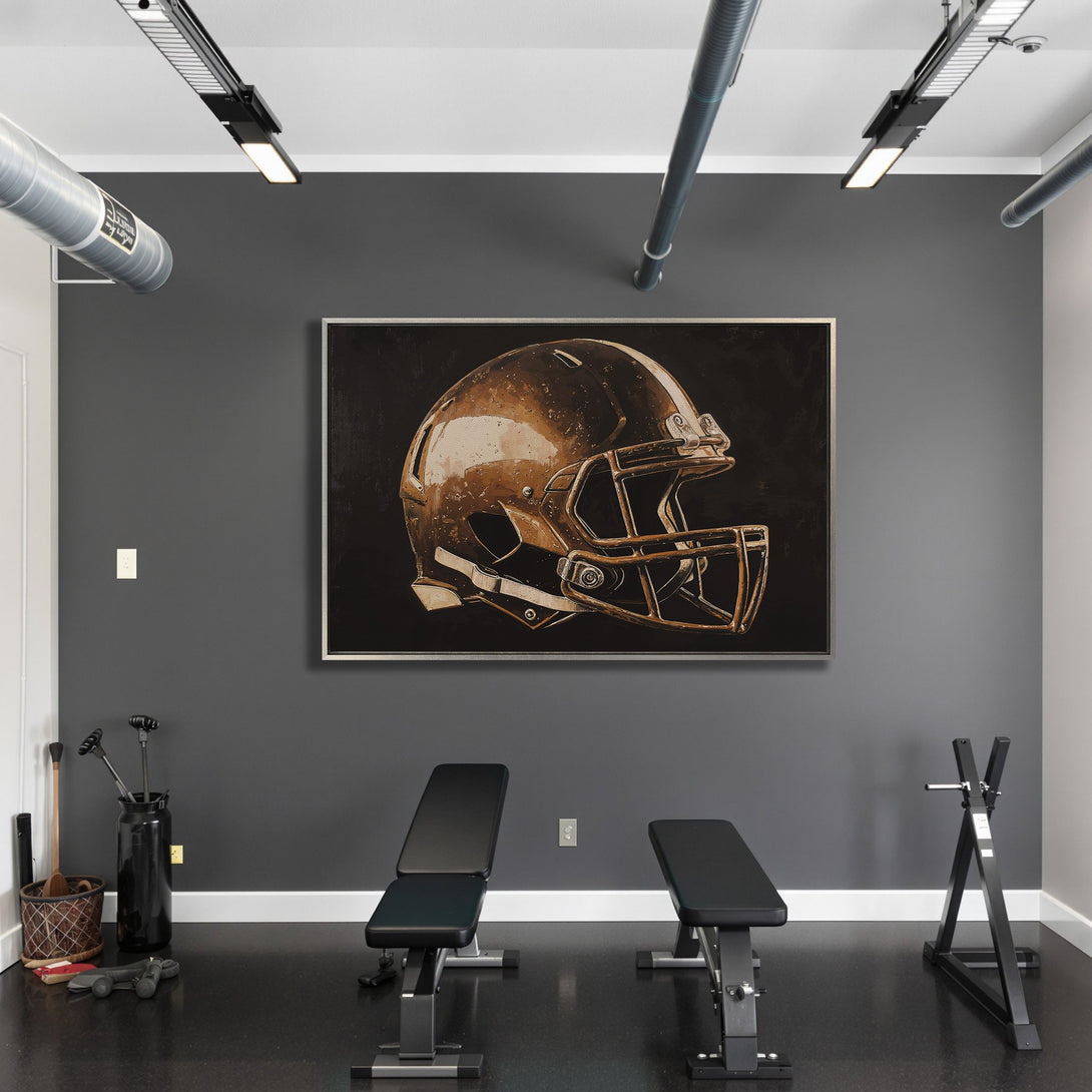 Framed Wall Art: Football helmet art in a modern gym. Bronze and black color palette adds a touch of sports-themed sophistication to any space.