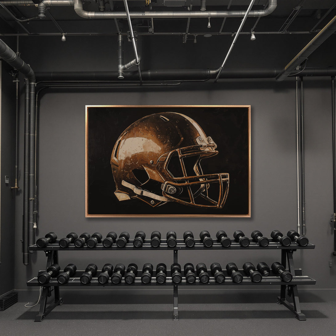 Framed Wall Art featuring a football helmet in a modern, industrial gym setting. Bronze and black color palette. Elevate your space with this stylish print.