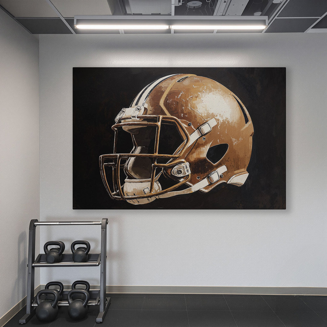 Framed Wall Art: Football helmet canvas print in a gym. Brown & white helmet against black background, gold frame. Modern decor with teal walls.