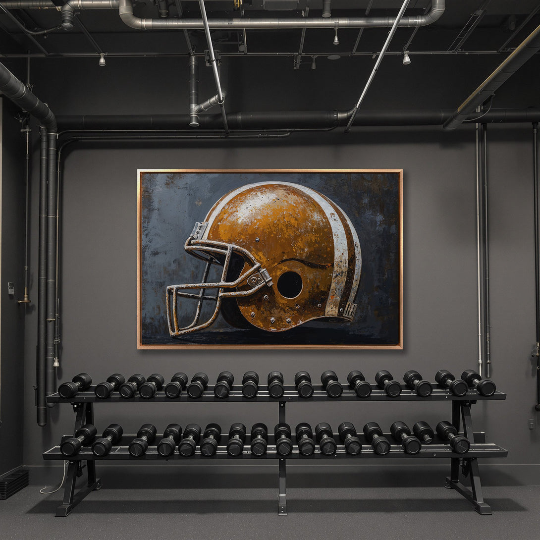 Framed Wall Art: Rustic football helmet art in a modern gym. Earthy tones of brown & grey create a stylish, industrial vibe. Elevate your space with this unique canvas print.