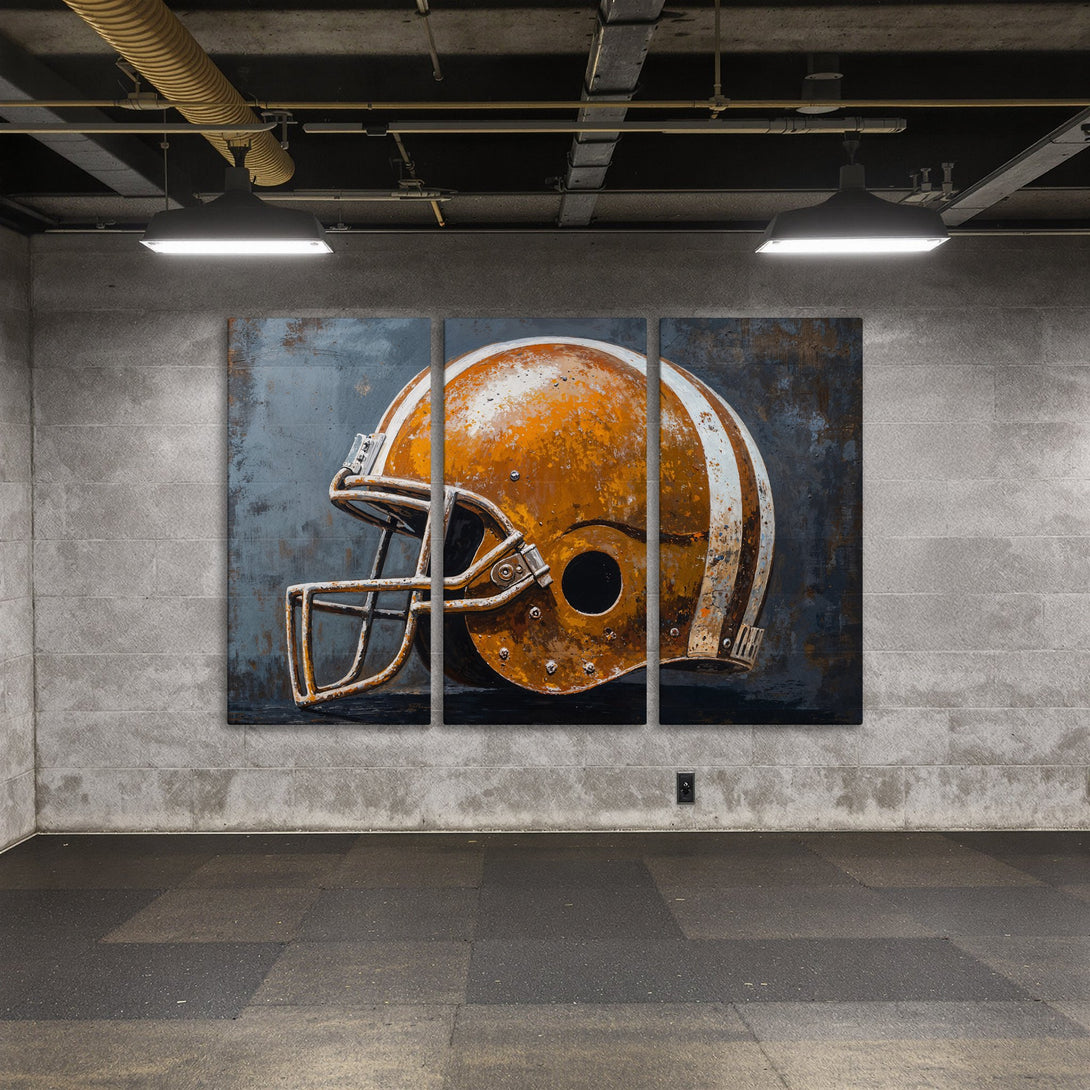 Canvas Print of a vintage football helmet in a rustic, industrial style. Features a warm orange and blue color palette, perfect wall art.