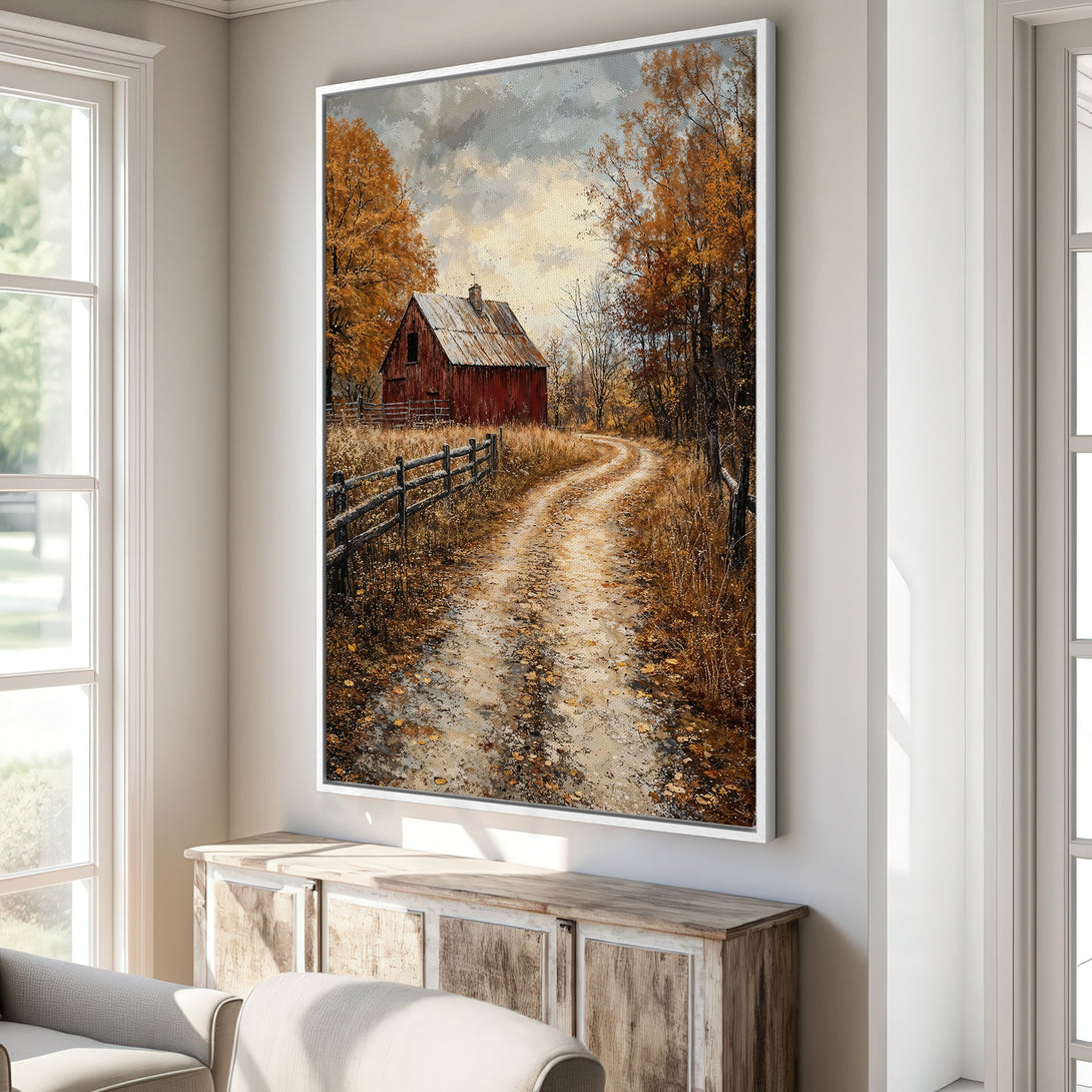 Framed Wall Art featuring a rustic barn scene. Warm, autumnal color palette with a country road. Perfect for adding cozy charm to your home decor.