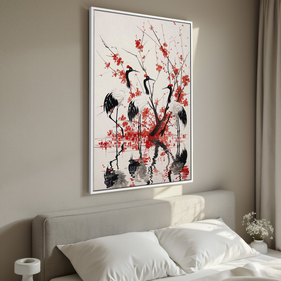Framed Wall Art: Japanese crane painting with red blossoms. Elegant black, white, and red art print. Perfect bedroom decor. Shop now for serene wall art!