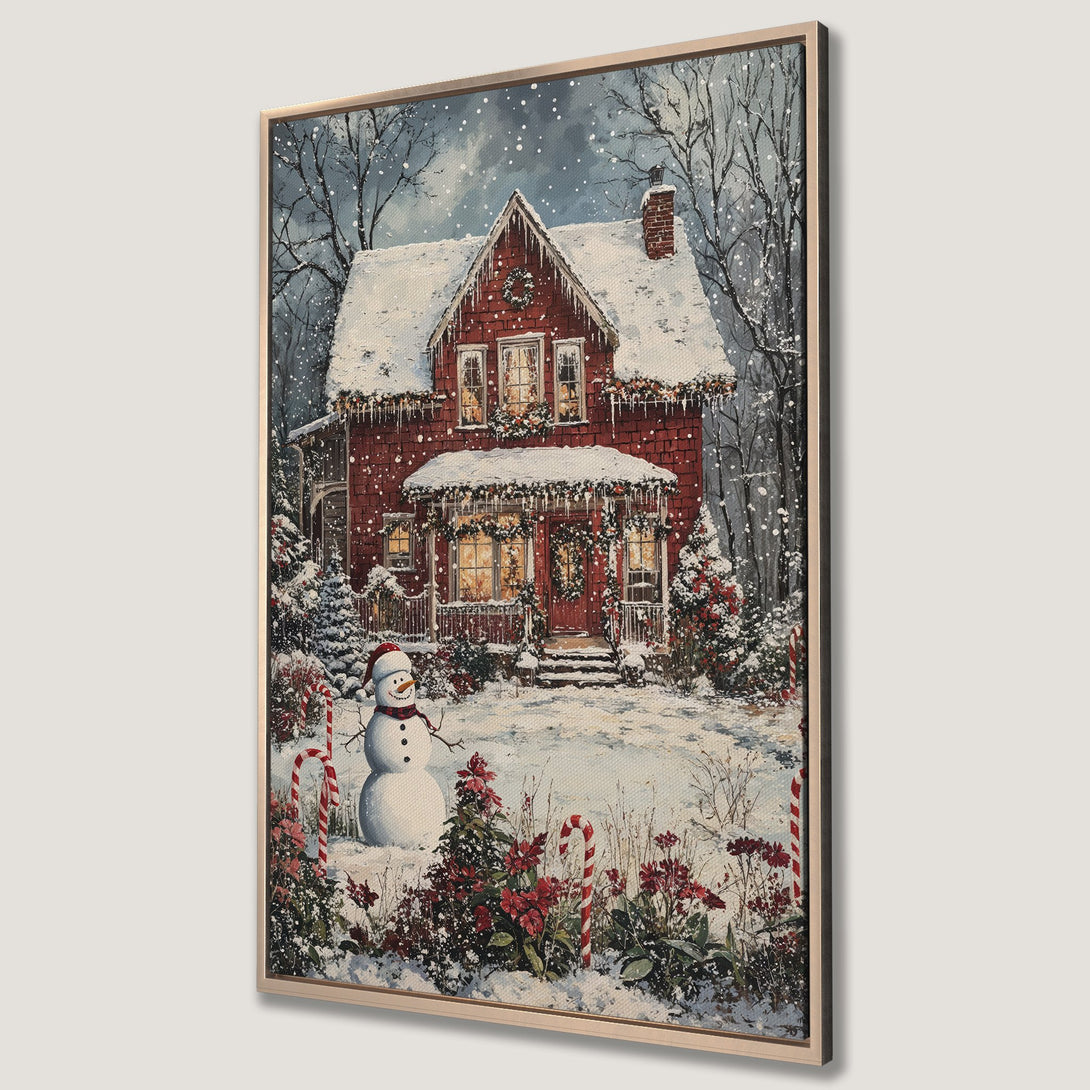 Framed Wall Art: Cozy winter scene Canvas Print featuring a red house, snowman, & snowy landscape. Warm, inviting colors perfect for Christmas decor.