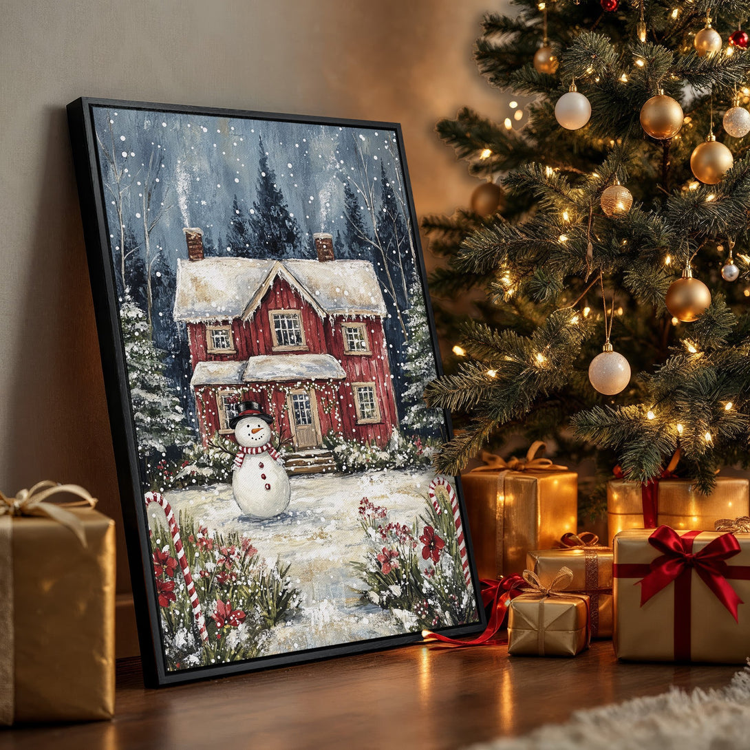 Framed Wall Art: Cozy winter scene Canvas Print featuring a red house and snowman, in a snowy landscape. Warm, inviting color palette perfect for holiday decor.