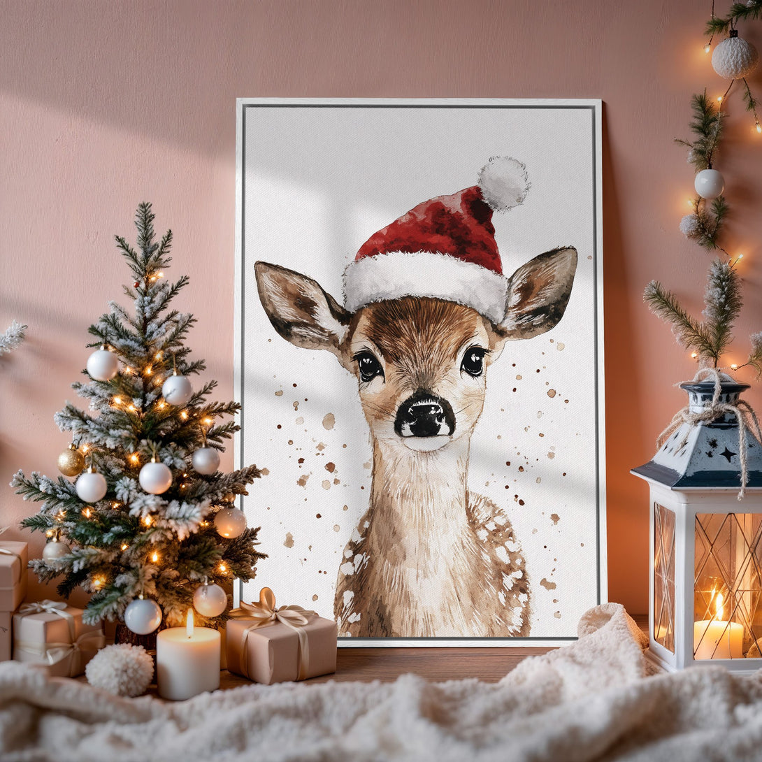 Framed Wall Art: Watercolor deer in Santa hat. Warm, neutral color palette perfect for holiday decor. Add cozy charm to your home!
