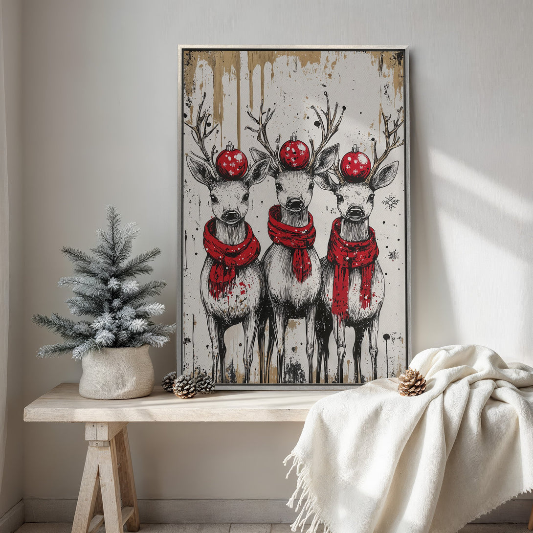 Framed Wall Art: Festive reindeer canvas print in a rustic style, featuring a red and white color palette. Perfect Christmas decor for your home!