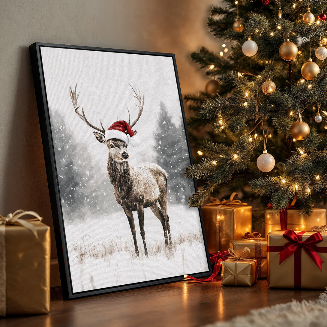 Framed Wall Art: Watercolor painting of a deer in a Santa hat, snowy scene. Neutral palette with pops of red. Perfect Christmas decor!
