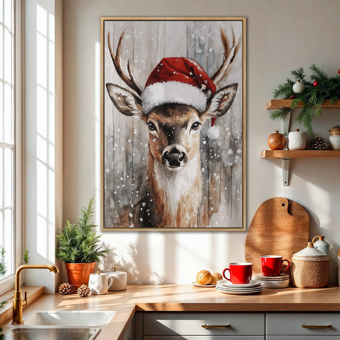 Framed Wall Art: Watercolor deer in Santa hat. Rustic holiday decor with red, brown, and gray tones. Perfect Christmas gift for cozy home interiors.