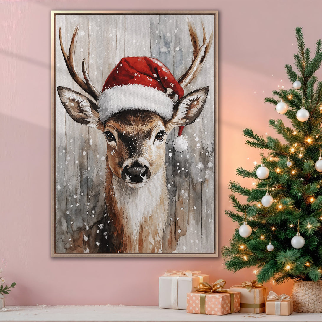 Framed Wall Art: Watercolor deer in Santa hat. Rustic style with warm brown, gray, and red tones. Perfect Christmas decor for a cozy home.