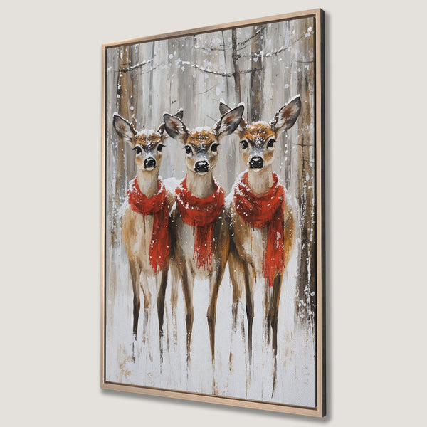 Framed Wall Art: Winter scene with three deer wearing red scarves. Rustic style with a neutral and red color palette. Perfect for cozy home decor.